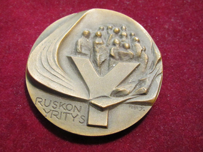 Ruskon Yritys. Mitali