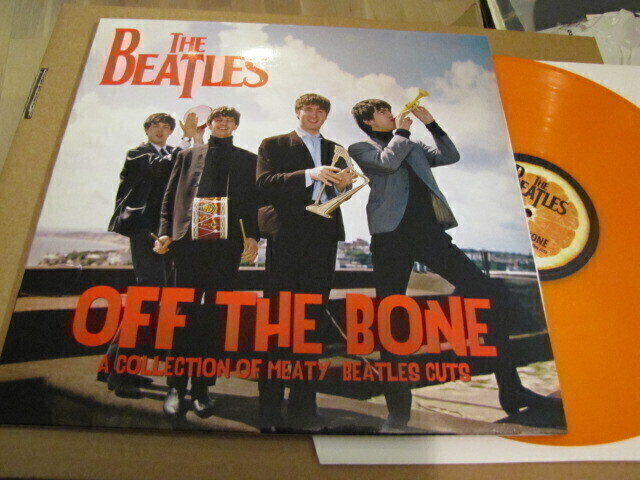 The Beatles Off the bone lp oranssi vinyyli soittamaton