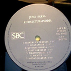 JUSSI SAKSA  ::  KOTISEUTURAPSODIA  ::  VINYYLI  LP    1989 - pikkukuva 4