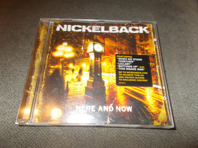 CD NICKELBACK ** HERE AND NOW **