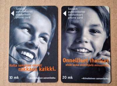 Onnelliset ihmiset ... rakkaus ... 2 puhelinkorttia v. 2000
