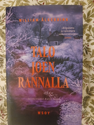 Talo joen rannalla