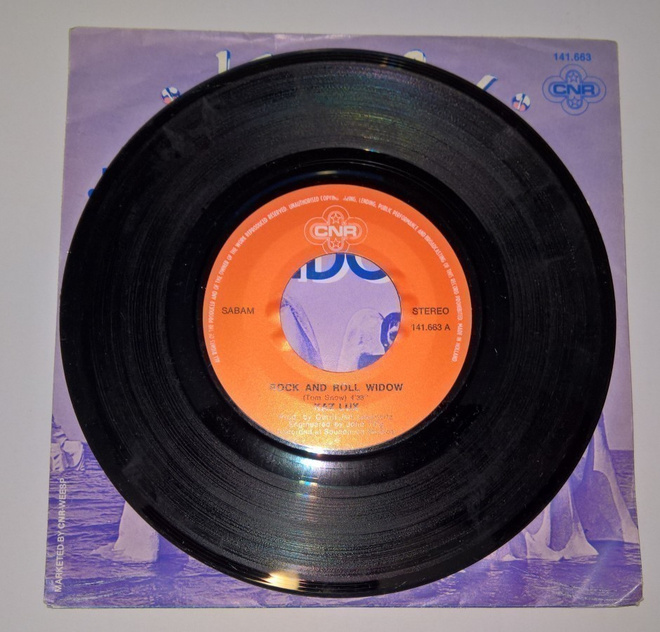 KAZ LUX ROCK AND ROLL WIDOW 141.663 A  7" 45RPM 1980  SABAM
