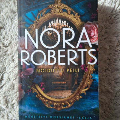 Nora Roberts: Noiduttu peili, nid.