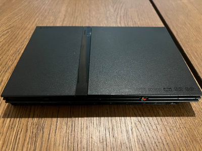 PS2 Slim SCPH-70004 / lukupää vaihdettu / pelkkä konsoli