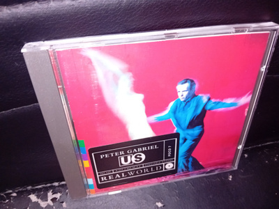 CD Peter Gabriel : US ( SIS POSTIKULU )