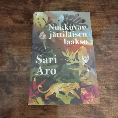 Nukkuvan jättiläisen laakso – Sari Aro