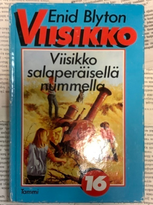Enid Blyton - Viisikko salaperäisellä nummella (sid.)