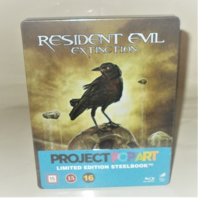 RESIDENT EVIL EXTINCTION  (LTD STEELBOOK BD) UUSI  (ALE 25%)