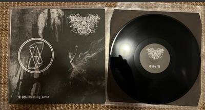 Drowning The Light - A World Long Dead LP