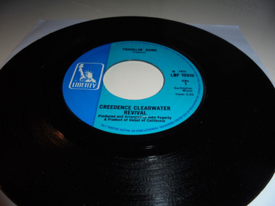 7" Creedence Clearwater Revival-Travelin' Band / Who’ll Stop