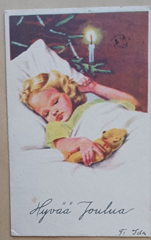 Lapsi nukahtanut nallen kanssa joulukuusen viereen, p. 1946