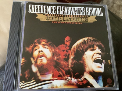 CREEDENCE CLEARWATER REVIVAL Featuring John Fogerty cd.