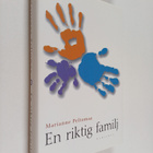 Marianne Peltomaa : En riktig familj (signeerattu) - pikkukuva 1