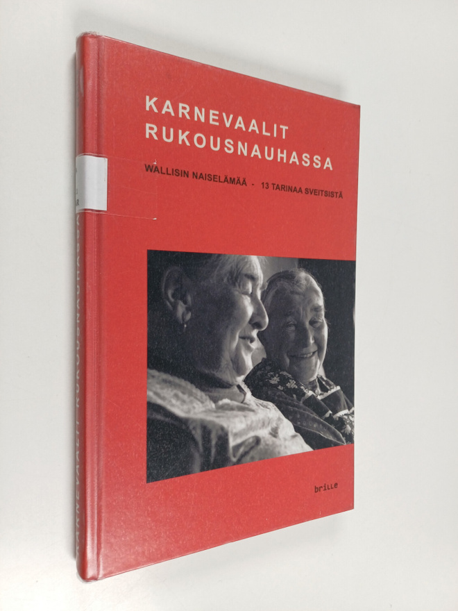 Karnevaalit rukousnauhassa : Wallisin naiselämää - 13 tar...