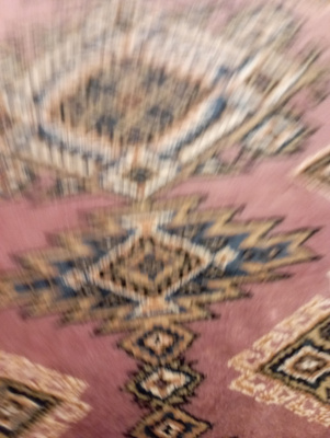 Pakistanilainen käsinsolmittu matto