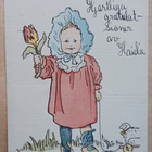 A. Bgn: Taapero toivottaa onnea tulppaanin kera, p. 1908 - pikkukuva 1