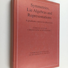 Jurgen Fuchs : Symmetries, lie algebras and representatio... - pikkukuva 1