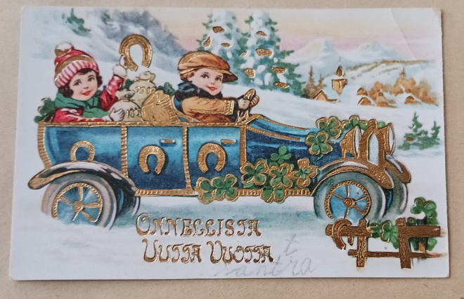 Lapset tuovat autolla Uuden Vuoden terveiset, k. k-k