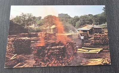 MAKING CHARCOAL AT JACK DANIEL'S, JACK DANIEL DISTILLERY