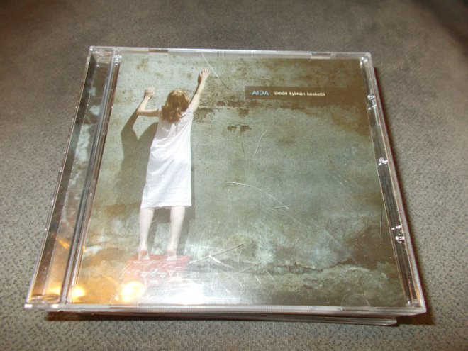 CD AIDA ** TÄMÄN KYLMÄN KESKELLÄ **