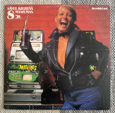 SÄVEL KIERTÄÄ MAAILMAA 8: Ja Rokki Soi (LP) 1974