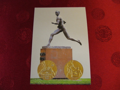 Paavo Nurmi kortti jossa kuvattu Paris 1924 kultamitali.