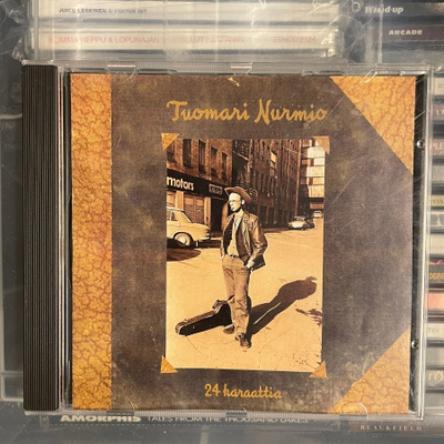 TUOMARI NURMIO - 24 Karaattia cd