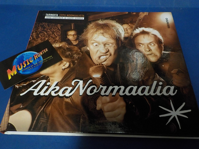 EPPU NORMAALI - AIKA NORMAALIA KIRJA KOKO BÄNDIN NIMMAREILLA
