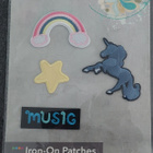 SILITYSPAIKKA SETTI UNICORN + SATEENKAARI + TÄHTI + MUSIG - pikkukuva 1