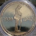 Talvisota 1939-1940. Kullanvärinen kolikko kapselissa. Halka - pikkukuva 1