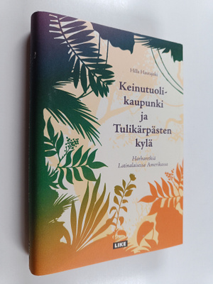 Hilla Hautajoki : Keinutuolikaupunki ja Tulikärpästen kyl...