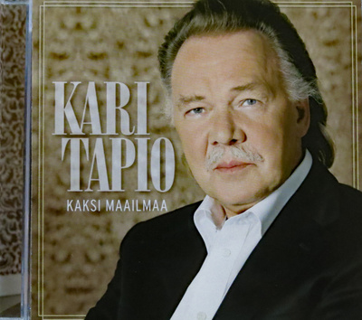 KARI TAPIO: KAKSI MAAILMAA