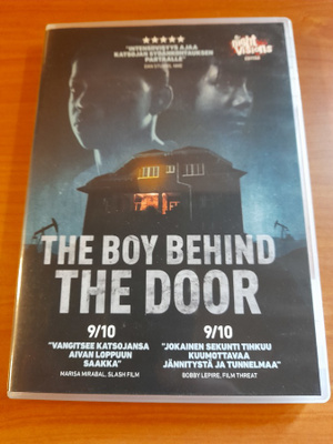 The Boy behind the door