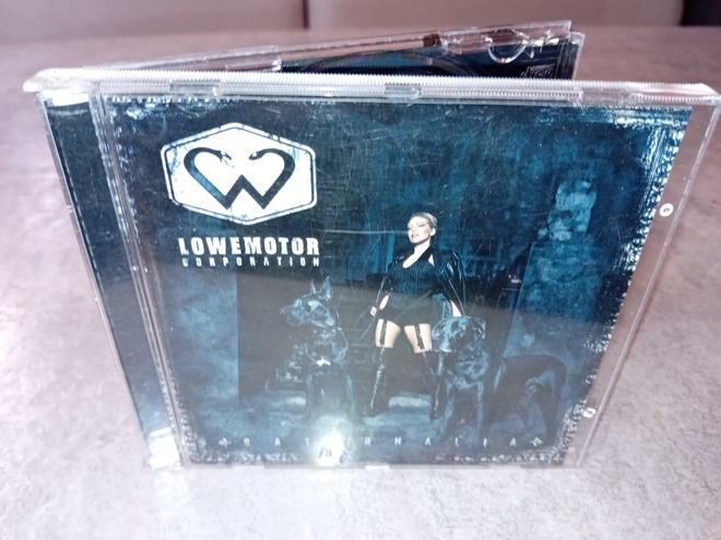 CD LOWEMOTOR CORPORATION : SATURNALIA ( SIGNED ) SIS POSTIKU