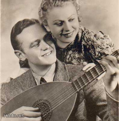 MUSIIKKI / Luuttua soittava mies ja kaunis tyttö. 1930-l.
