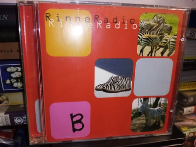 CD RINNERADIO : B ( SIS POSTIKULU)