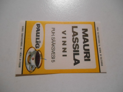 TT Etiketti Paulig Mauri Lassila Vinni Sääksvesi