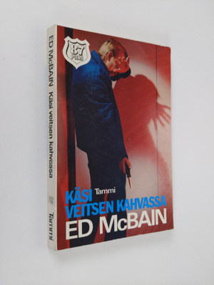 Ed McBain : Käsi veitsen kahvassa