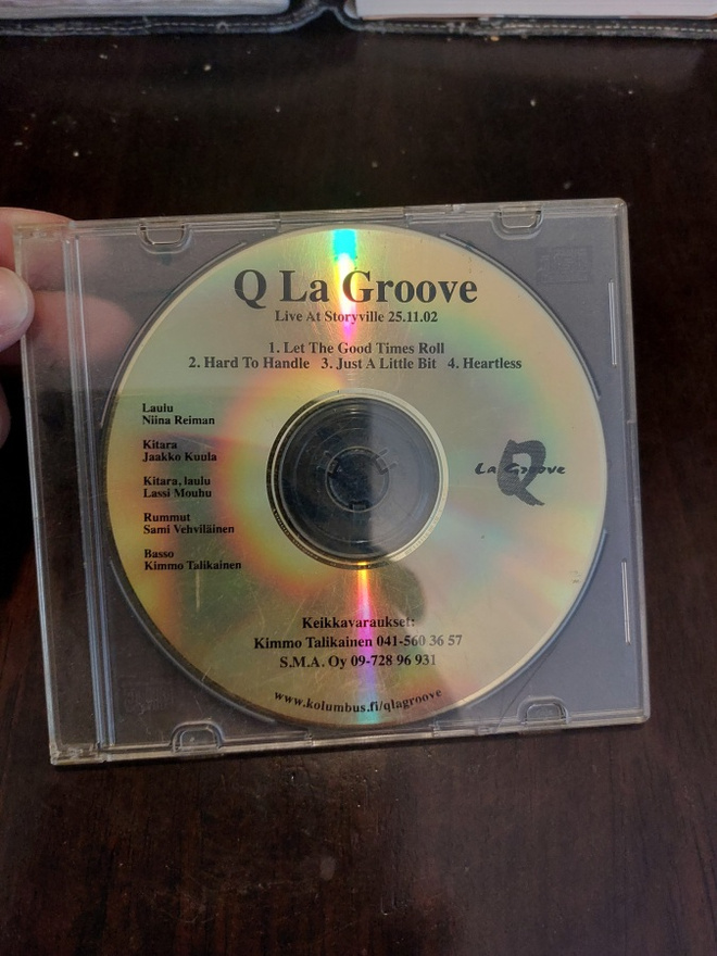 Q La Groove cd-levy nimikirjoituksilla