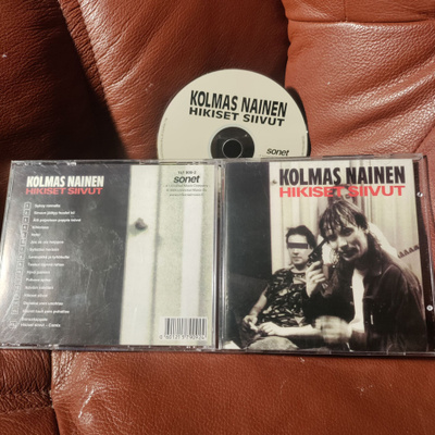 KOLMAS NAINEN -Hikiset siivut CD.