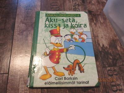Ankalliskirjasto 4 - Aku-Setä, Kissa ja koira