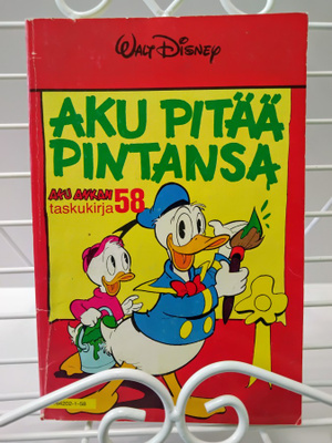 Aku Ankan taskukirja 58 Aku pitää pintansa 1.p