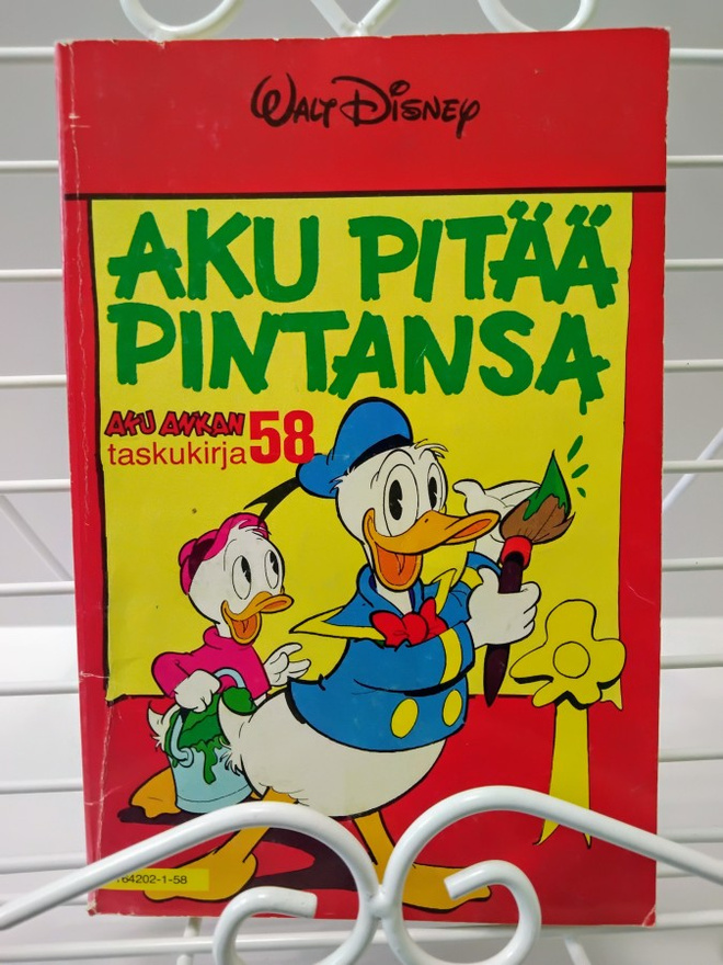 Aku Ankan taskukirja 58 Aku pitää pintansa 1.p