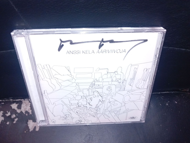 CD Anssi Kela : Ääriviivoja  ( SIGNED  ) SIS POSTIKULU