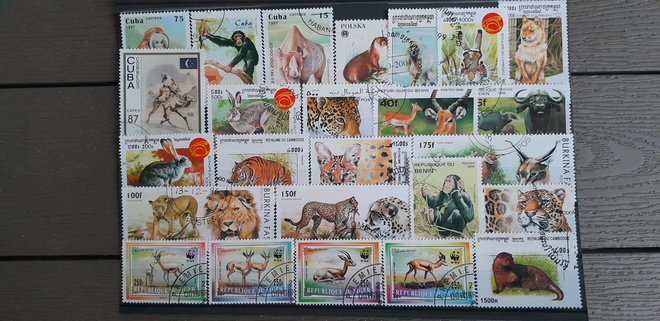 VILLIELÄIMIÄ LEIMATTUJA postimerkkejä 25 kpl