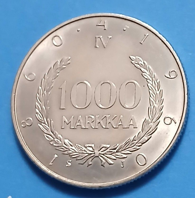 Hopeinen juhlaraha 1000 mk vuodelta 1960.