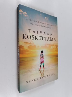 Nancy Ravenhill : Taivaan koskettama : innoittavia tosike...