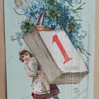 Uuden Vuoden tyttö kantaa kalenteria ja kukkia, p. 1910 - pikkukuva 1