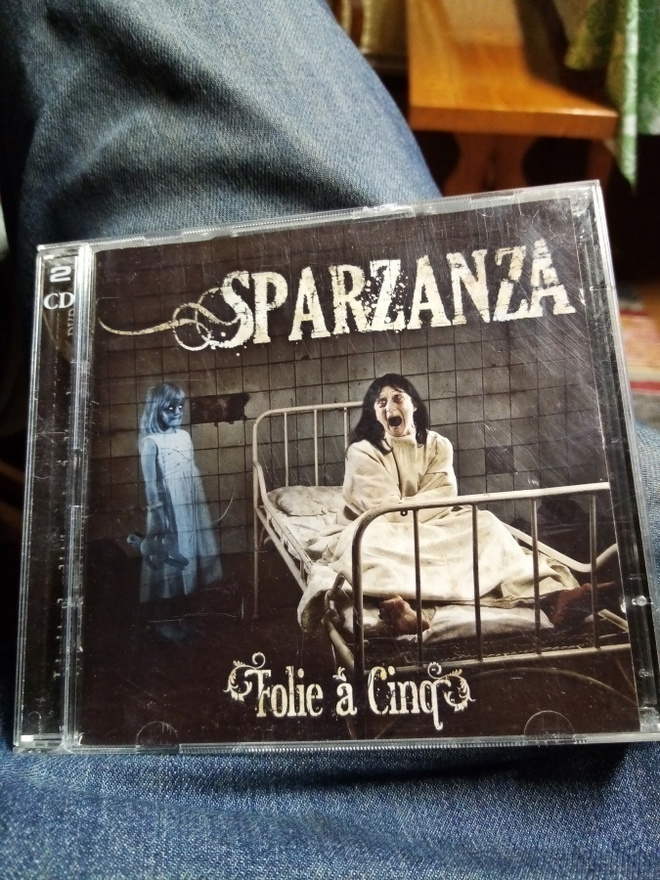 CD +  DVD  Sparzanza : Folie a Cinq ( Sis. postikulut )